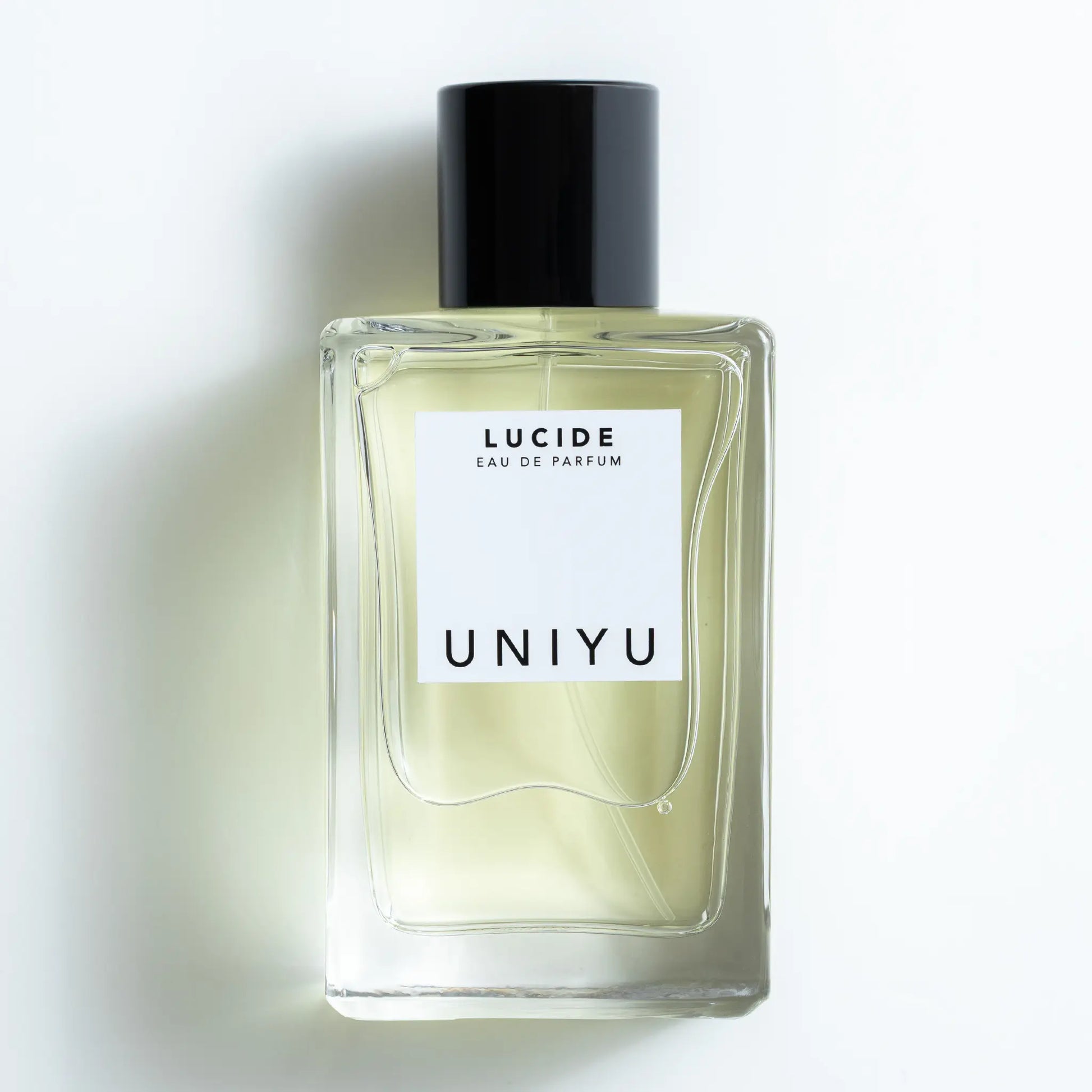 LUCIDE by UNIYU, a fragrance of creativity and clarity, combining bergamot, violet, lily of the valley, cedarwood, vanilla, and musk.