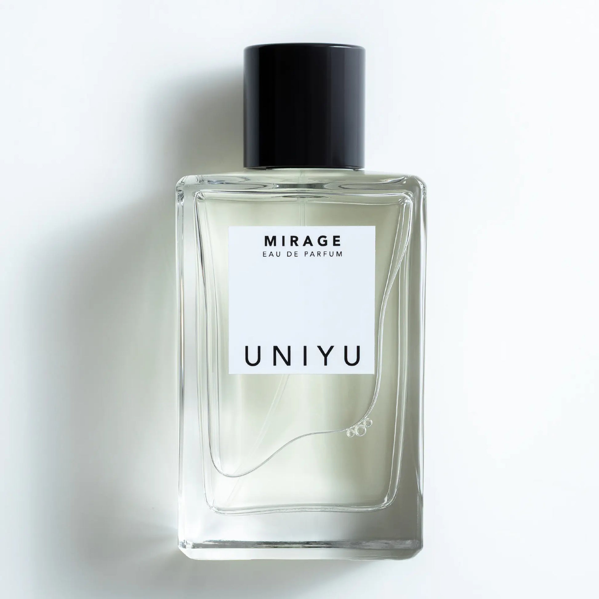MIRAGE by UNIYU, capturing resilience with fresh lemon, aromatic juniper, floral orange blossom and earthy dry woods